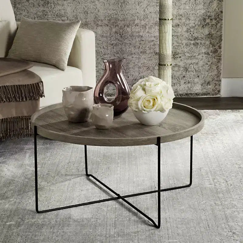 Table d'appoint ronde – Plateau beige, pieds en fer noir, style industriel